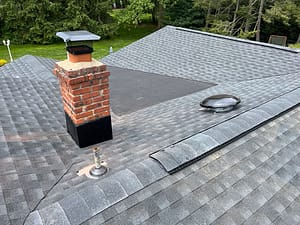 New Attic Fan, Ridge Vent & Chimney Flashing